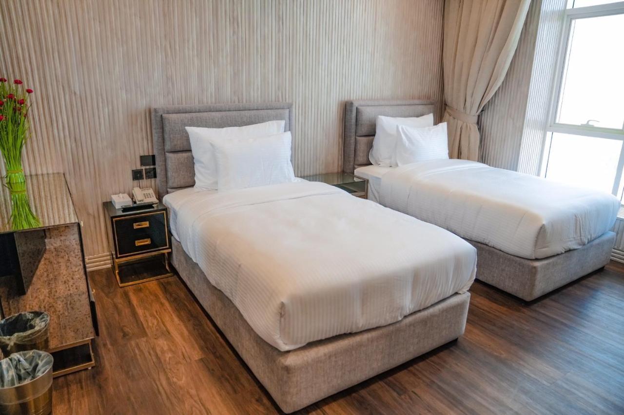 M14 Hotel Apartment ราสอัลไคมาห์ ภายนอก รูปภาพ